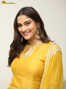 actress Saiee Manjrekar sexy looks in a yellow salwar dress