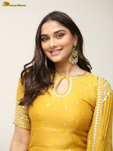 actress Saiee Manjrekar sexy looks in a yellow salwar dress