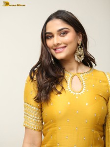 actress Saiee Manjrekar sexy looks in a yellow salwar dress