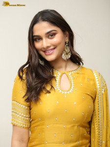actress Saiee Manjrekar sexy looks in a yellow salwar dress