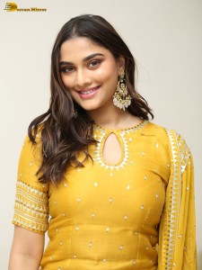 actress Saiee Manjrekar sexy looks in a yellow salwar dress