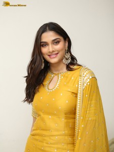 actress Saiee Manjrekar sexy looks in a yellow salwar dress