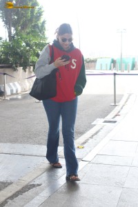 actress Saiee Manjrekar stylish looks in jeans and jacket at mumbai airport