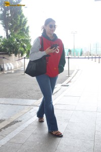 actress Saiee Manjrekar stylish looks in jeans and jacket at mumbai airport