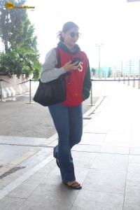 actress Saiee Manjrekar stylish looks in jeans and jacket at mumbai airport