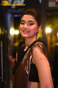 Saiee Manjrekar attending Ghani movie function in a brown shiny saree