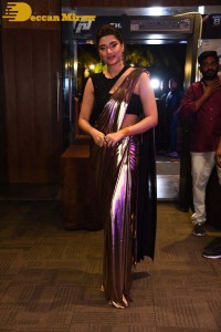 Saiee Manjrekar attending Ghani movie function in a brown shiny saree