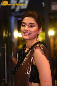 Saiee Manjrekar attending Ghani movie function in a brown shiny saree