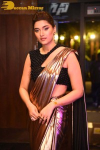 Saiee Manjrekar attending Ghani movie function in a brown shiny saree