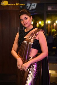 Saiee Manjrekar attending Ghani movie function in a brown shiny saree