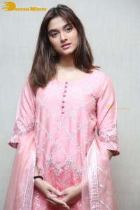 Actress Saiee Manjrekar in a pink dress