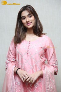 Actress Saiee Manjrekar in a pink dress