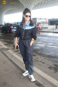 actress Saiyami Kher in track suit at airport