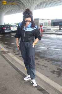 actress Saiyami Kher in track suit at airport