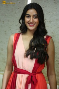 Actress sakshi vaidya in a sleeveless dress posing for pictures