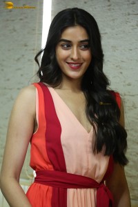 Actress sakshi vaidya in a sleeveless dress posing for pictures