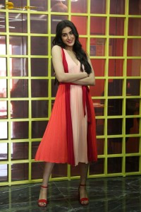 Actress sakshi vaidya in a sleeveless dress posing for pictures