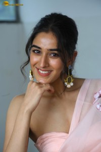 actress sakshi vaidya cute looks in a shoulderless blouse and saree