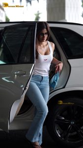 actress sakshi malik sexy in a white top and denim jeans