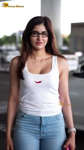 actress sakshi malik sexy in a white top and denim jeans