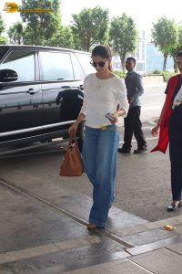 tollywood actress samantha in a white t-shirt and blue denim jeans at mumbai airport