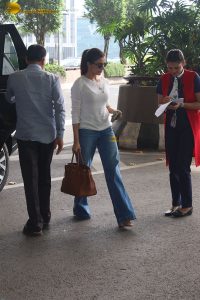 tollywood actress samantha in a white t-shirt and blue denim jeans at mumbai airport