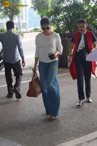 tollywood actress samantha in a white t-shirt and blue denim jeans at mumbai airport