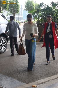 tollywood actress samantha in a white t-shirt and blue denim jeans at mumbai airport