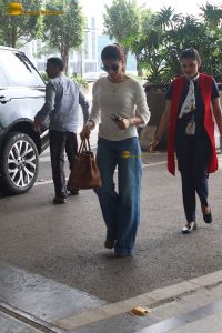 tollywood actress samantha in a white t-shirt and blue denim jeans at mumbai airport