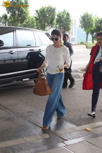 tollywood actress samantha in a white t-shirt and blue denim jeans at mumbai airport