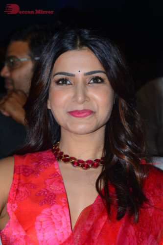 Telugu Actress Samantha Akkineni attending a movie function dressed in a red saree