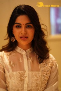 Actress Samyuktha Menon in a white salwar kameez