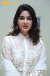 Actress Samyuktha Menon in a white salwar kameez
