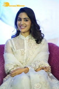 Actress Samyuktha Menon in a white salwar kameez