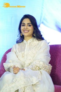 Actress Samyuktha Menon in a white salwar kameez