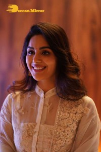 Actress Samyuktha Menon in a white salwar kameez