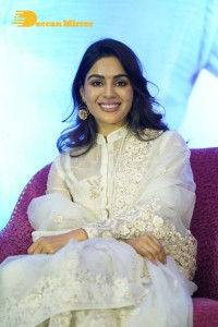 Actress Samyuktha Menon in a white salwar kameez