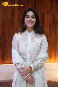 Actress Samyuktha Menon in a white salwar kameez