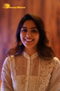 Actress Samyuktha Menon in a white salwar kameez