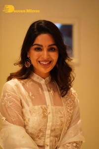 Actress Samyuktha Menon in a white salwar kameez