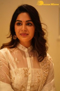 Actress Samyuktha Menon in a white salwar kameez