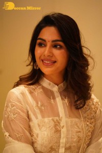 Actress Samyuktha Menon in a white salwar kameez