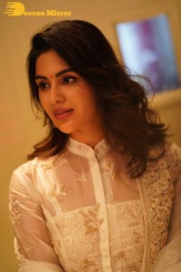Actress Samyuktha Menon in a white salwar kameez
