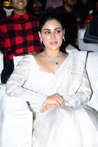 actress samyuktha menon in a white saree attending a movie event