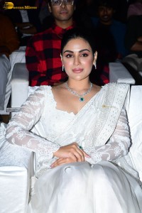 actress samyuktha menon in a white saree attending a movie event