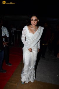 actress samyuktha menon in a white saree attending a movie event