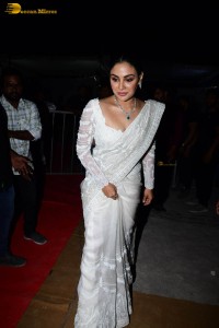 actress samyuktha menon in a white saree attending a movie event