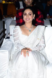 actress samyuktha menon in a white saree attending a movie event