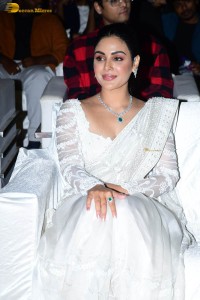 actress samyuktha menon in a white saree attending a movie event