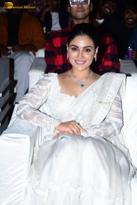 actress samyuktha menon in a white saree attending a movie event